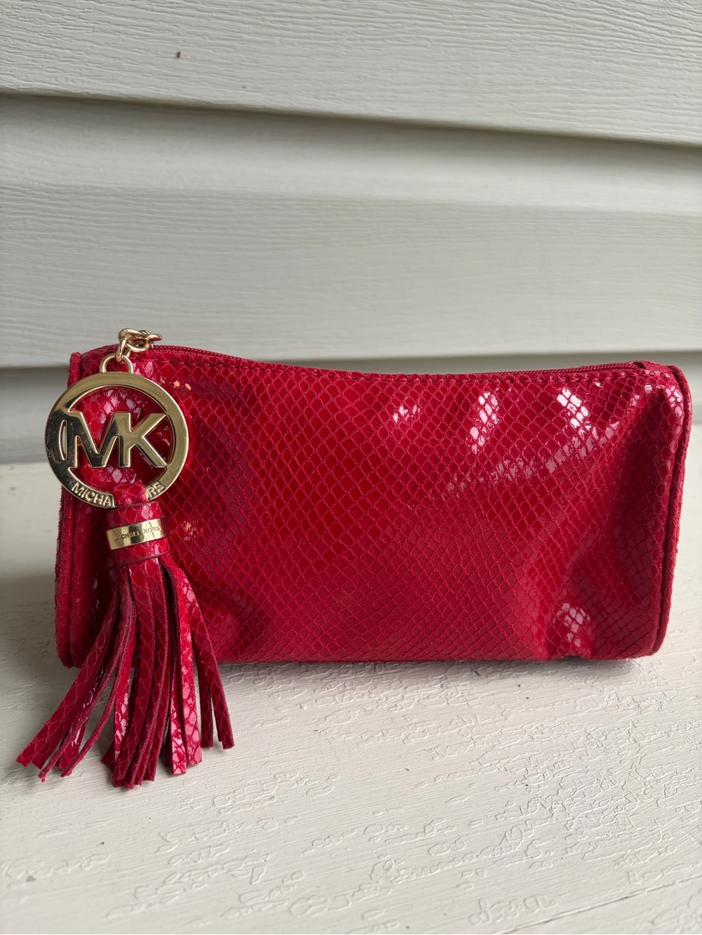 Michael Kors Shiny Red Snake-Embossed Makeup Bag with Tassel Charm